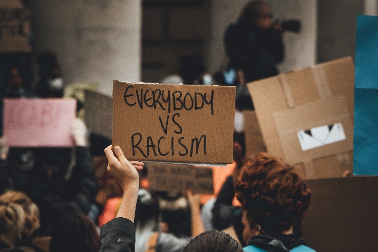 Microaggressions and an Update to the Definition of Racism
